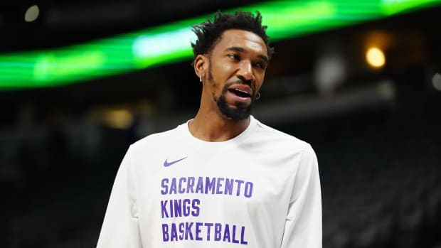 Feb 14, 2024; Denver, Colorado, USA; Sacramento Kings guard Malik Monk (0 before the game against the Denver Nuggets at Ball Arena. Mandatory Credit: Ron Chenoy-USA TODAY Sports